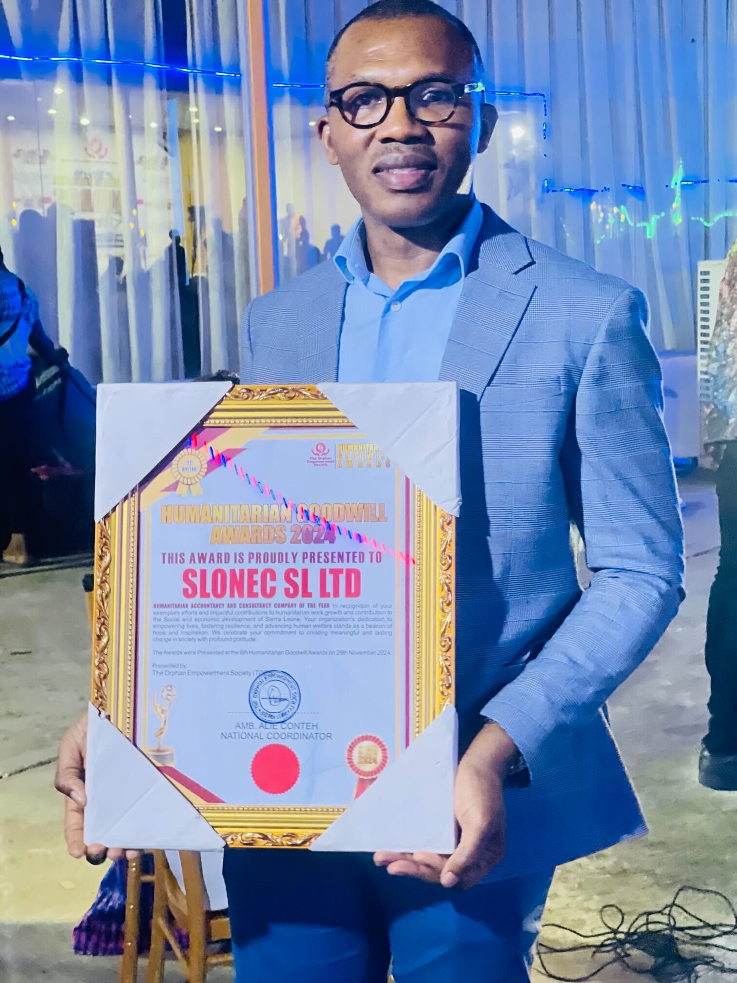 SLONEC receiving recognition at the Humanitarian Goodwill Awards 2024