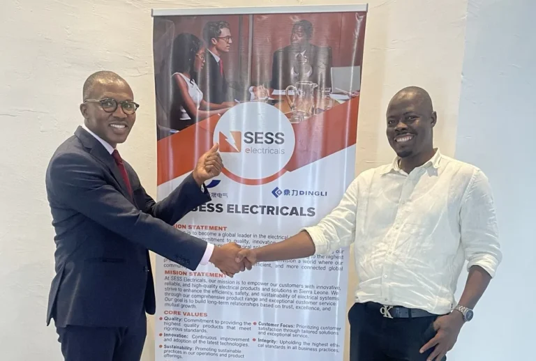 SLONEC and SESS Electricals shaking hands at the client celebration