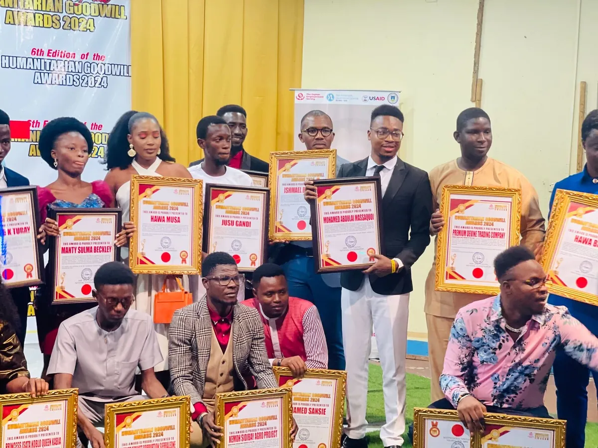 Award winners with certificates at the 6th Humanitarian Goodwill Awards 2024