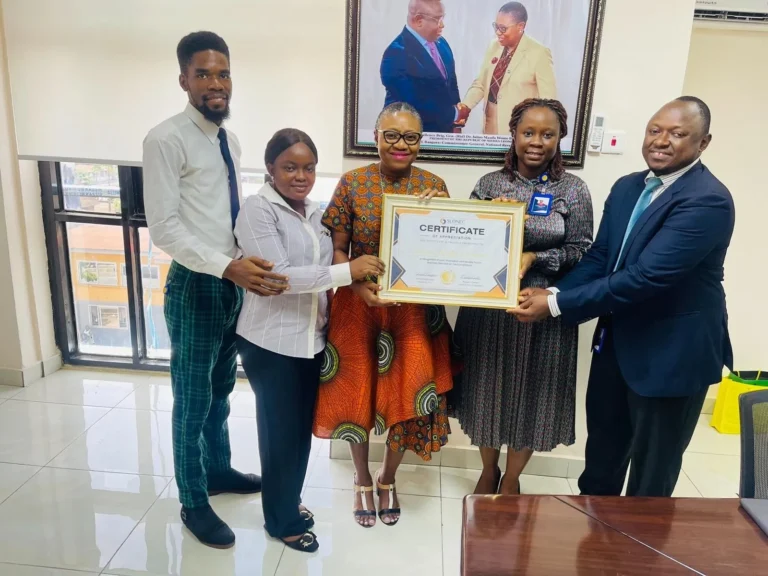 SLONEC presenting a certificate of honour to the NRA Commissioner General