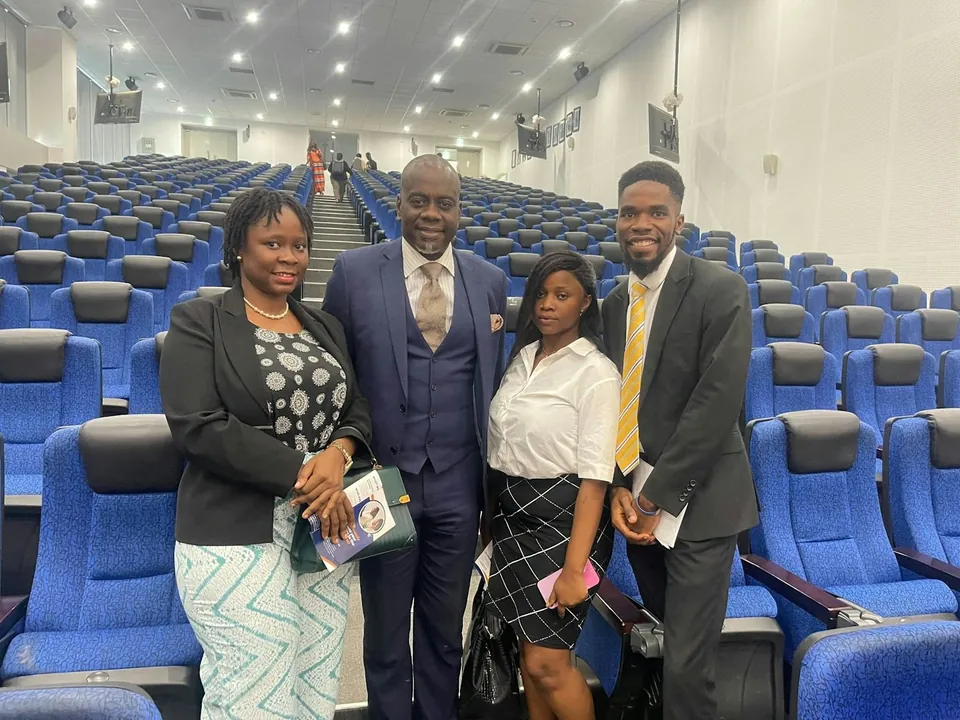 SLONEC team members at a business event in Freetown