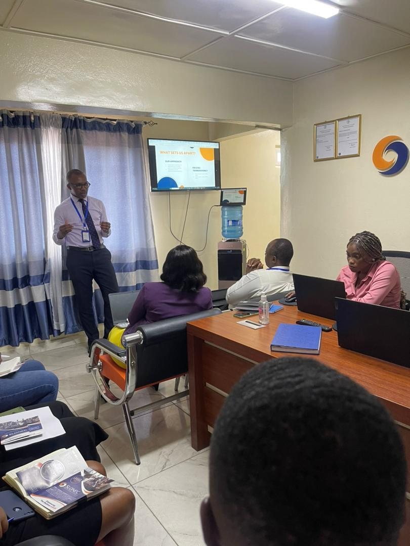 Participants in a SLONEC business transformation session at the Freetown office