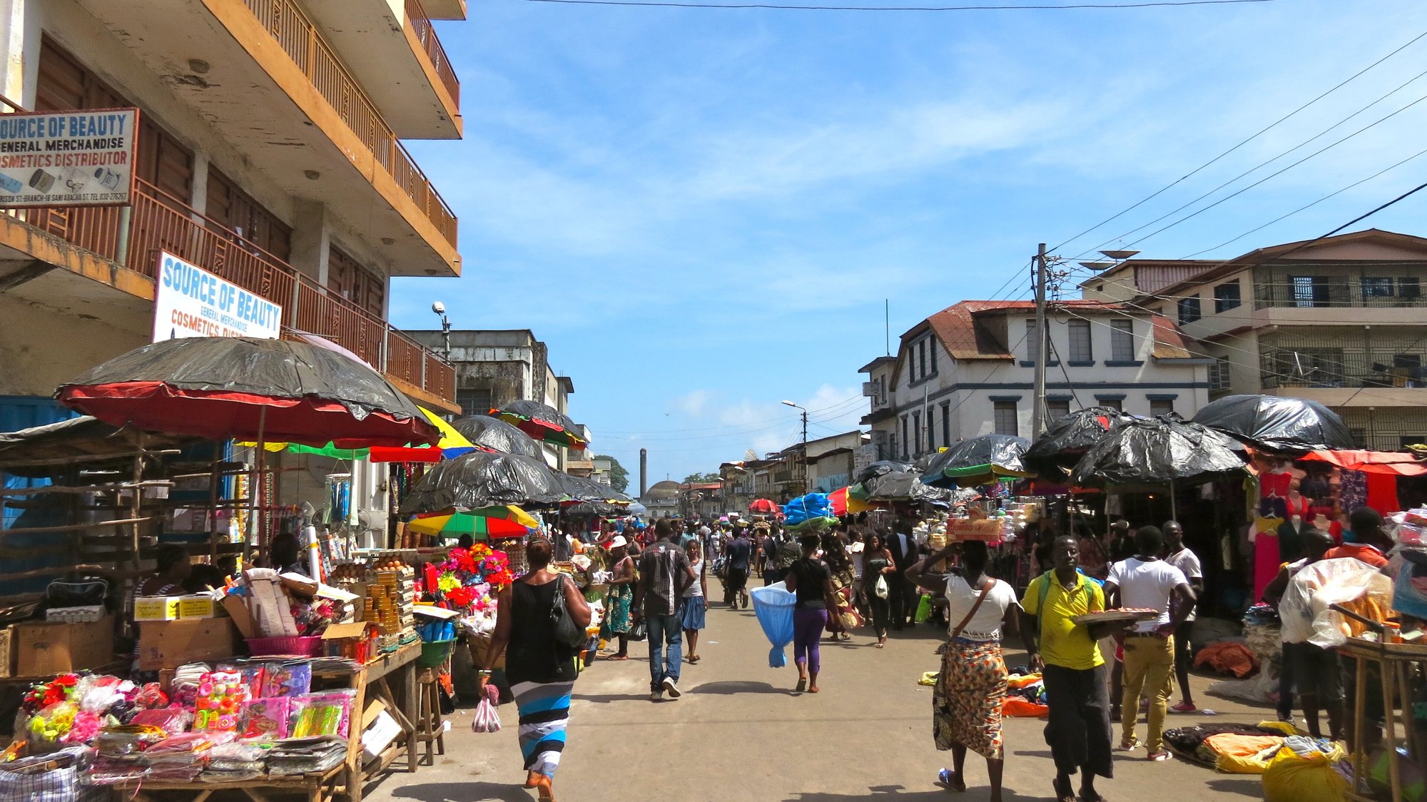 Shops and traders on a busy street in Freetown