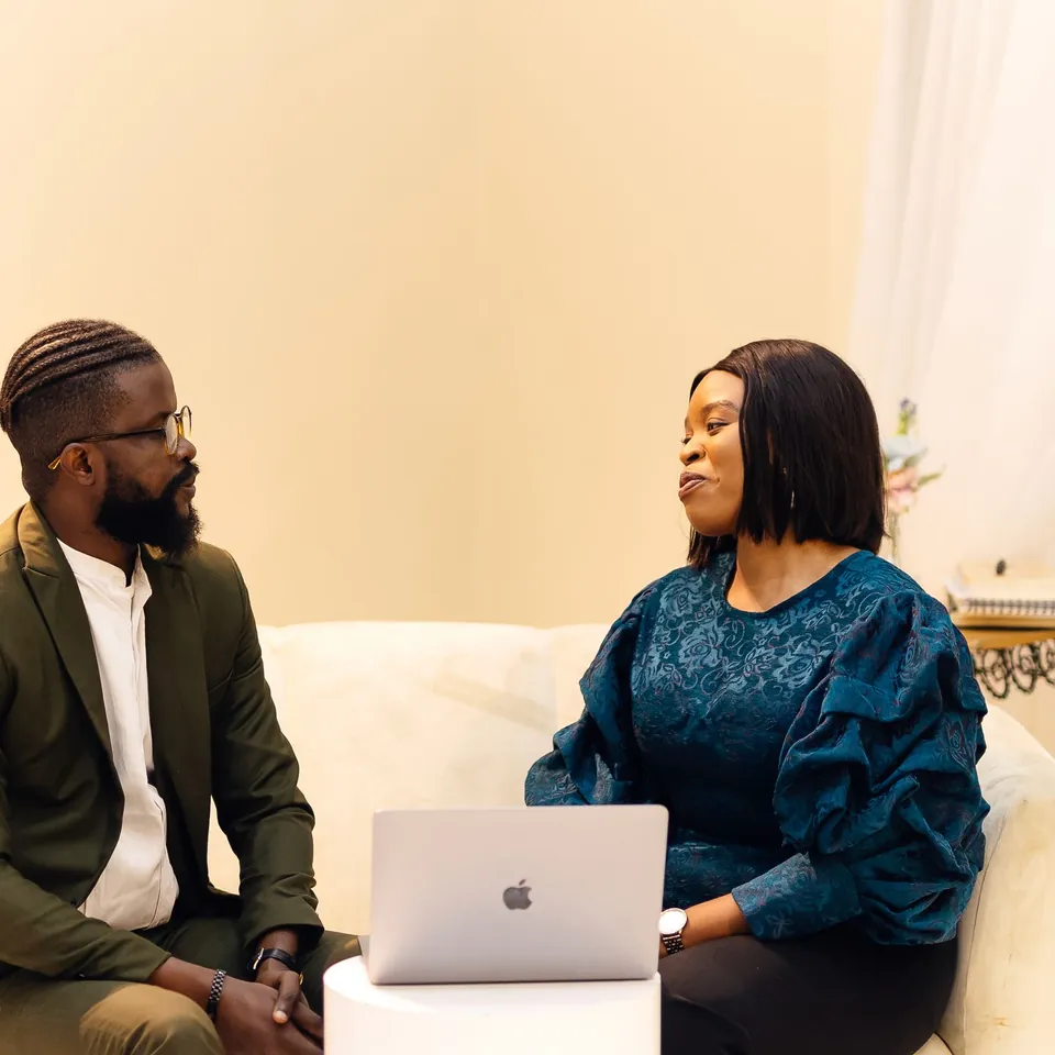 A business adviser in discussion with a client