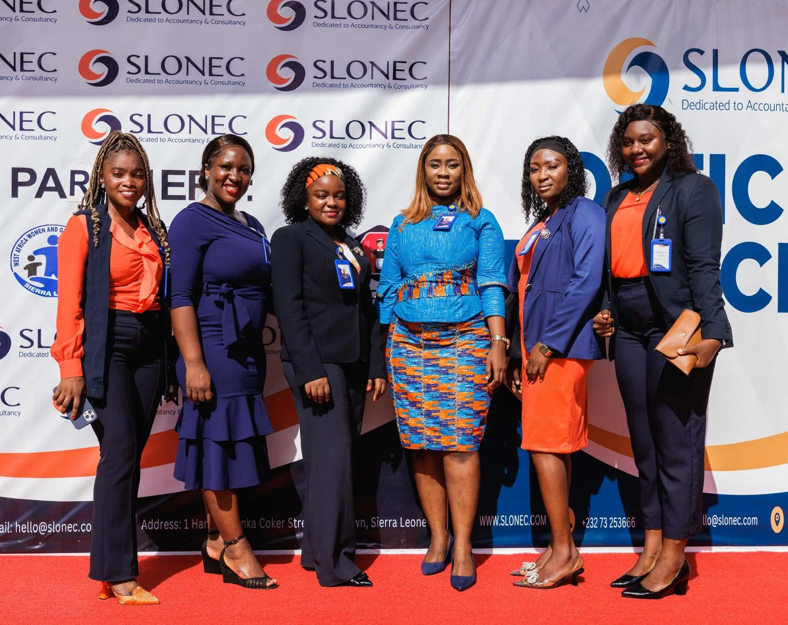 SLONEC colleagues on the red carpet at SLONEC's official launch at the Bintumani Hotel, Freetown