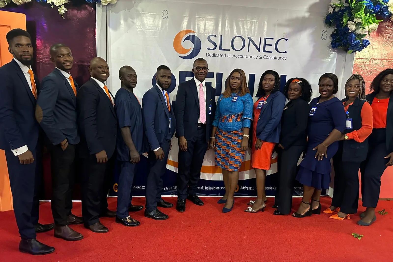 The SLONEC team in navy suits at SLONEC's official launch at the Bintumani Hotel, Freetown