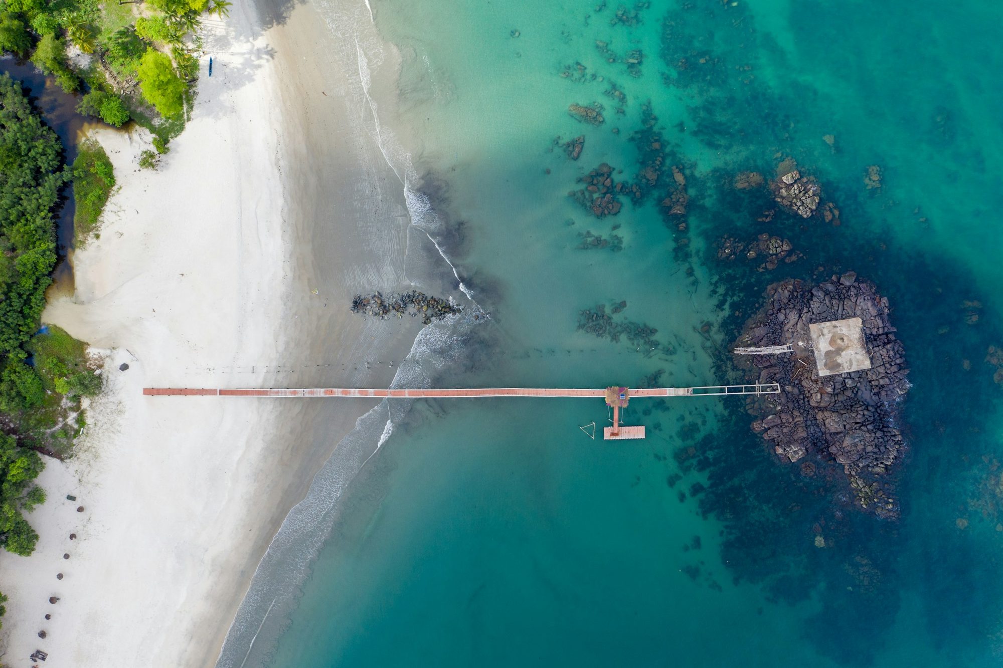 Aerial view of the turquoise beach at Tokeh, Western Area, Sierra Leone