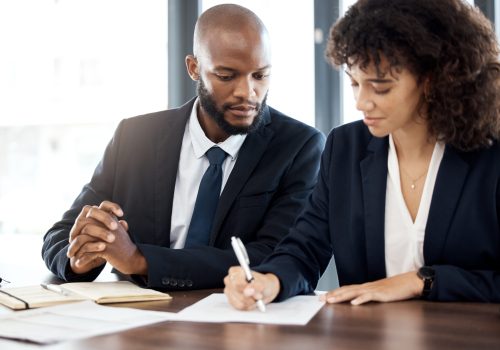 Documents, business and black people writing notes for accounting strategy, planning and company po.