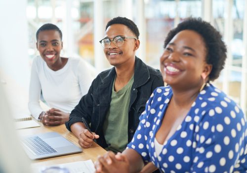 Shot of a group of young businesspeople having a meeting in a modern office.